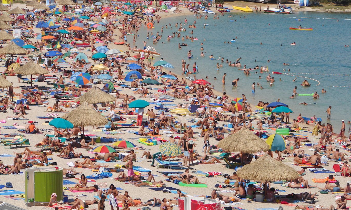 Door de hitte zullen de stranden in Zuid-Europa druk worden bezocht. Foto: Adobe Stock
