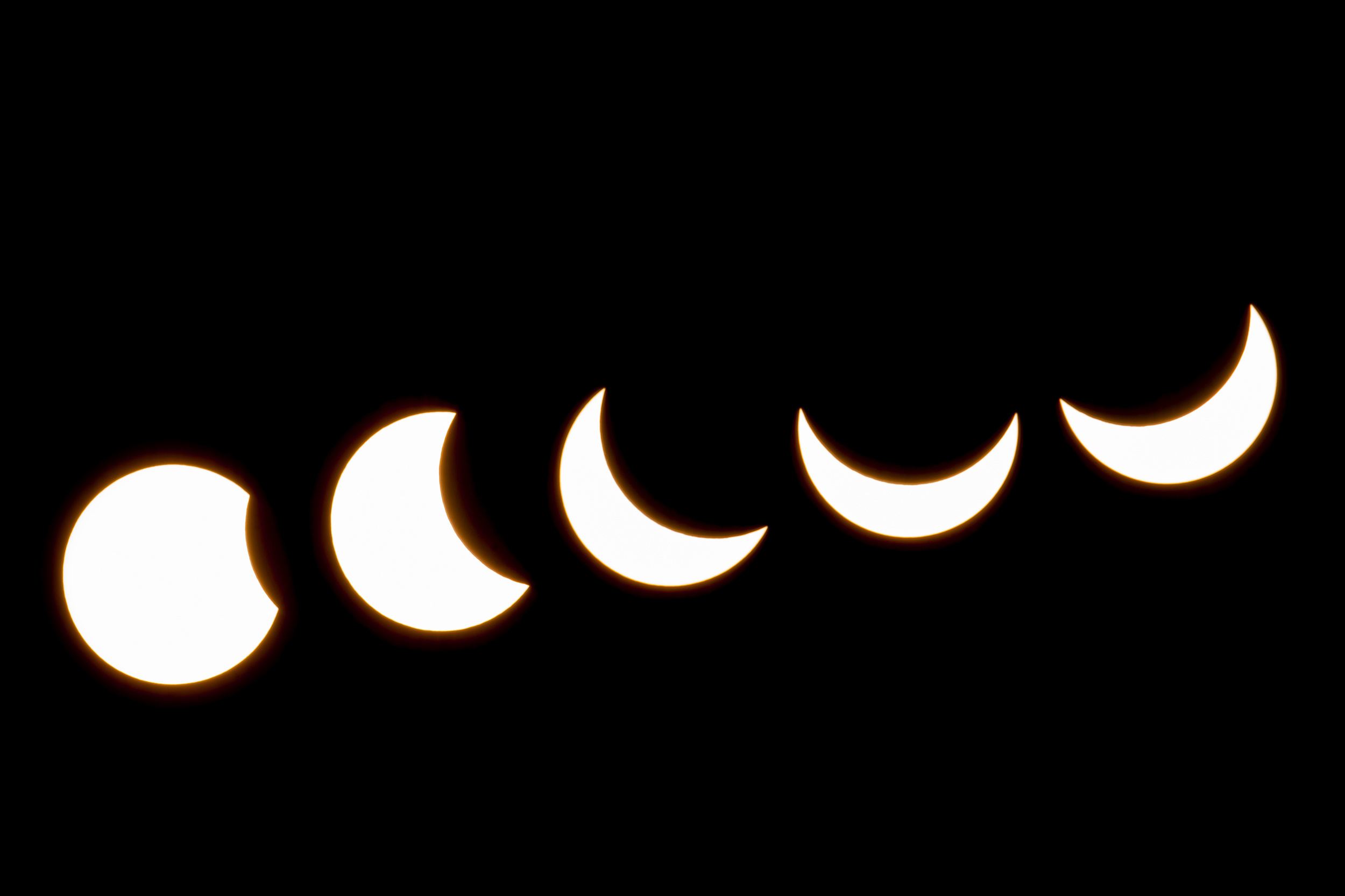 Verschillende fasen van een zonsverduistering.
Foto: Adobe Stock / Bruno_A