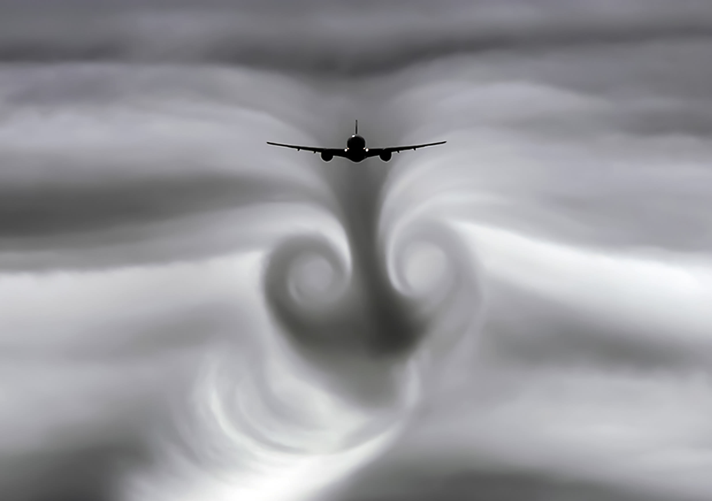 De turbulentie veroorzaakt door een vliegtuig is vaak te zien als het bewolkt is. Foto: AdobeStock / hlxandr.