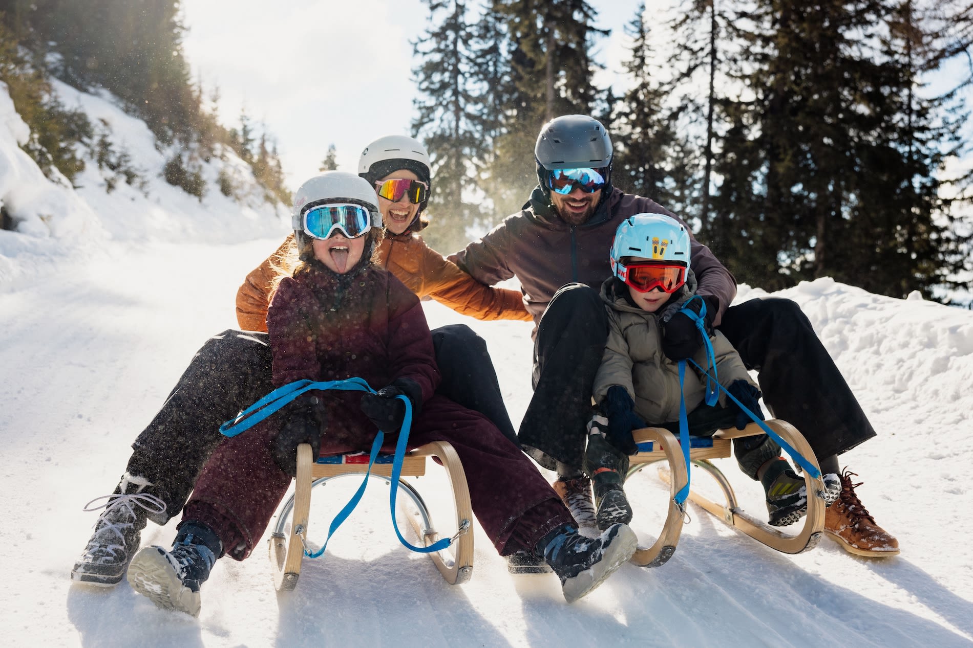 Sleeën met het gezin. Foto: Tirol Werbung / Haindl Ramon