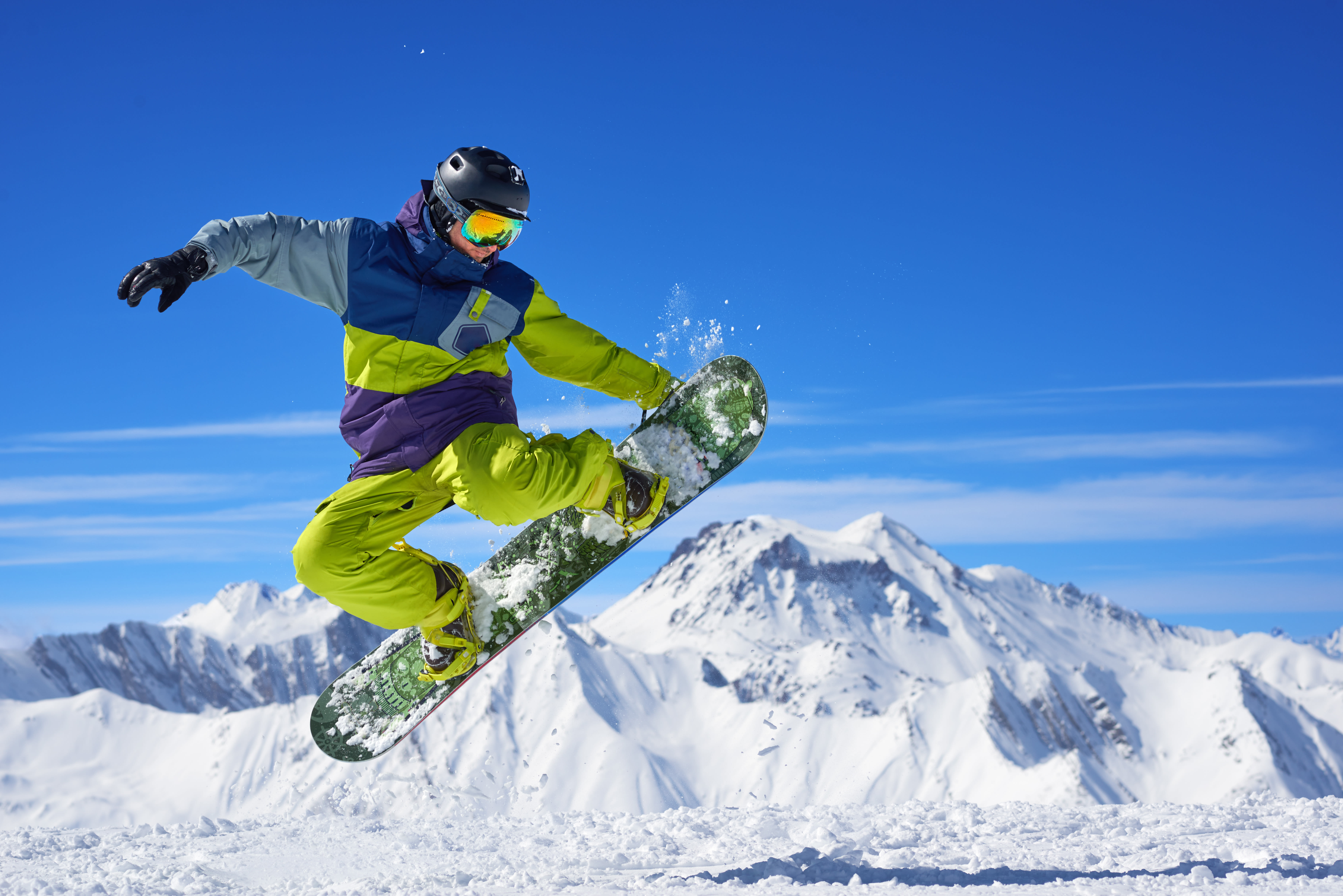 Snowboarden in de Alpen. Foto: Adobe Stock /  Artanq.
