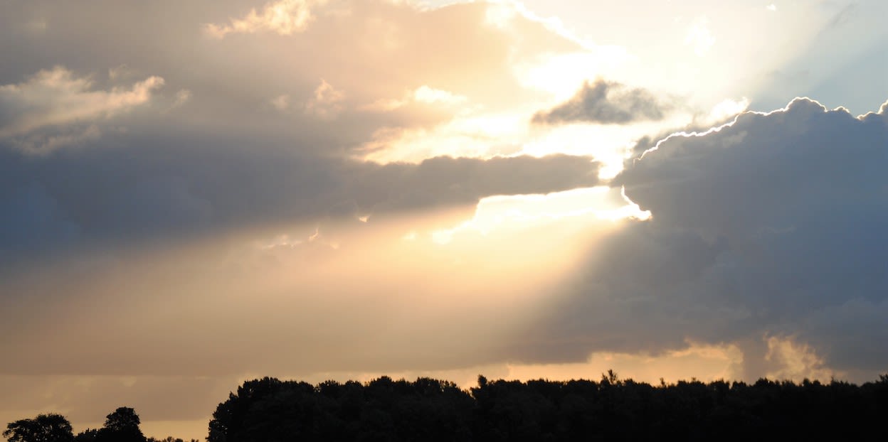 Zon schuil achter de wolken
Foto: Luuk Gransjean