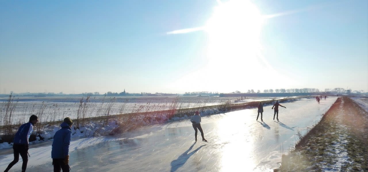 57f80f72-schaatsijs-zon-1280x600